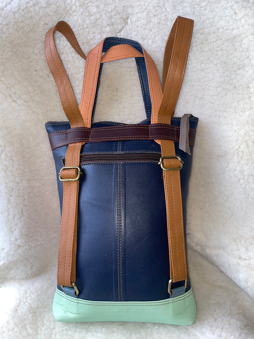Handcrafted, Recycled Leather & Hide Backpack with Detachable Clutch.