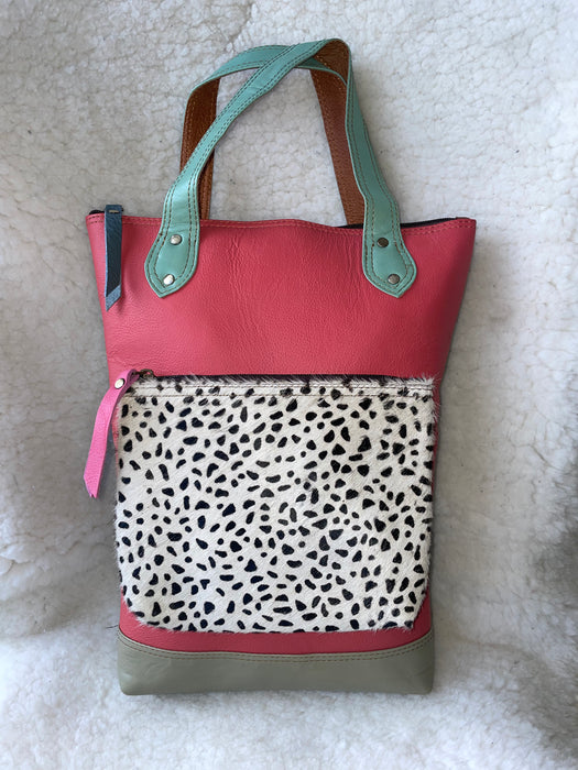 Handcrafted, Recycled Leather & Hide Backpack with Detachable Clutch.