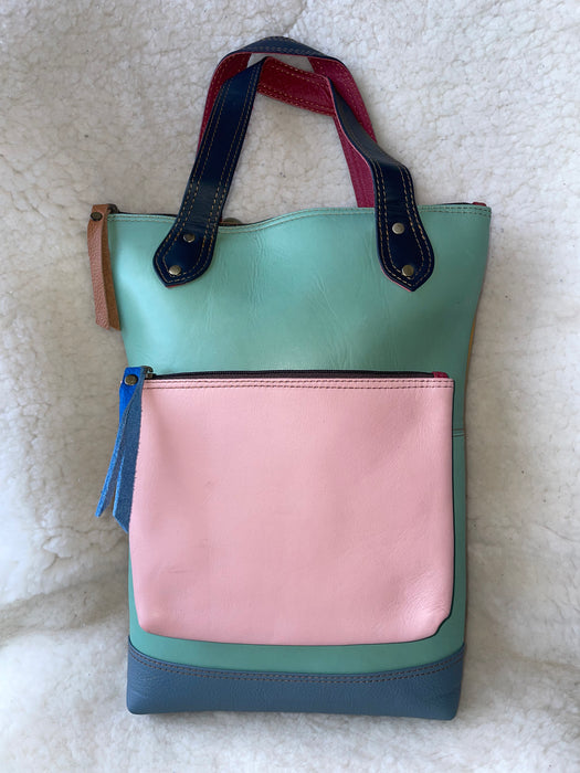 Handcrafted, Recycled Leather & Hide Backpack with Detachable Clutch.