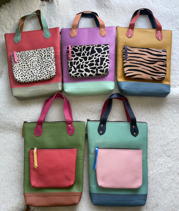 Handcrafted, Recycled Leather & Hide Backpack with Detachable Clutch.