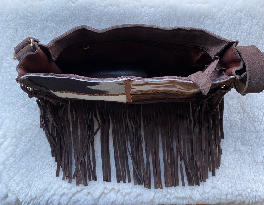 Leather, Suede and Hide Bags.