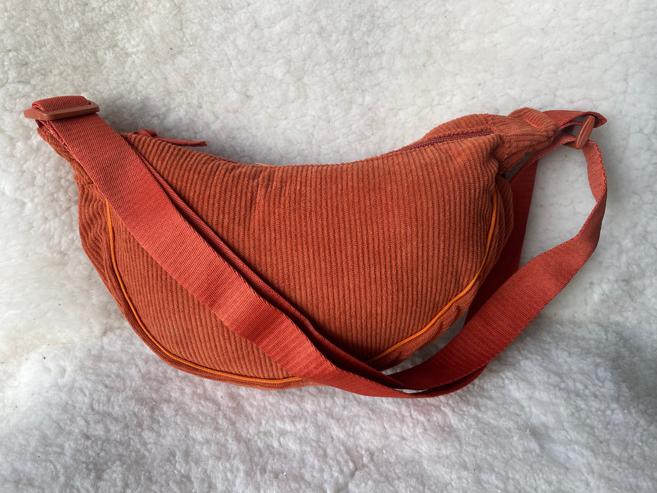 Half-Moon Corduroy Sling Bag.